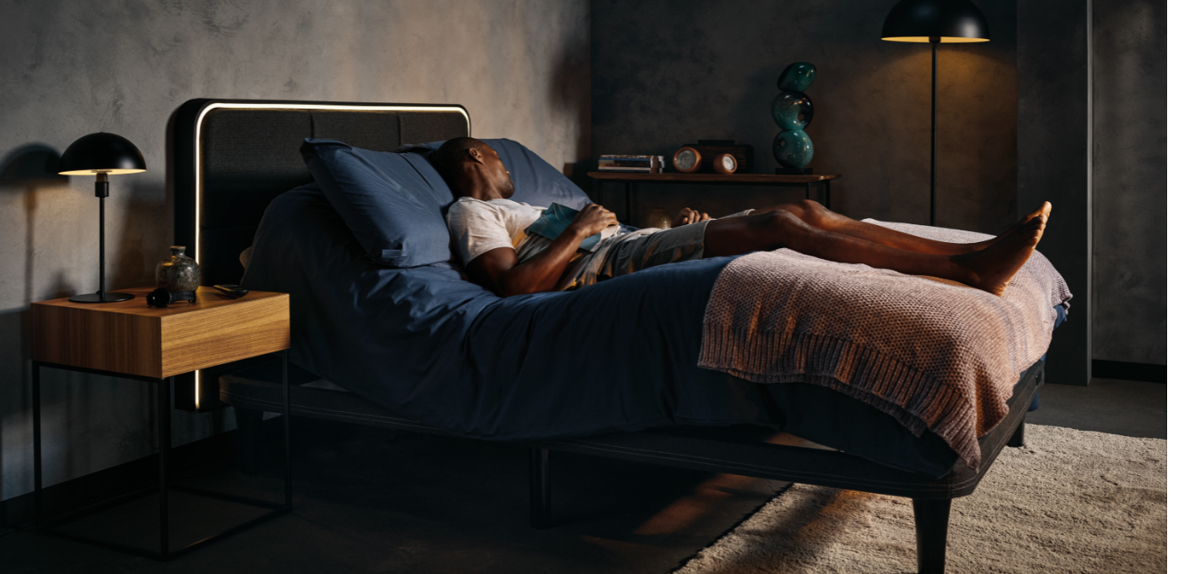 Swimmer resting on an adjustable bed