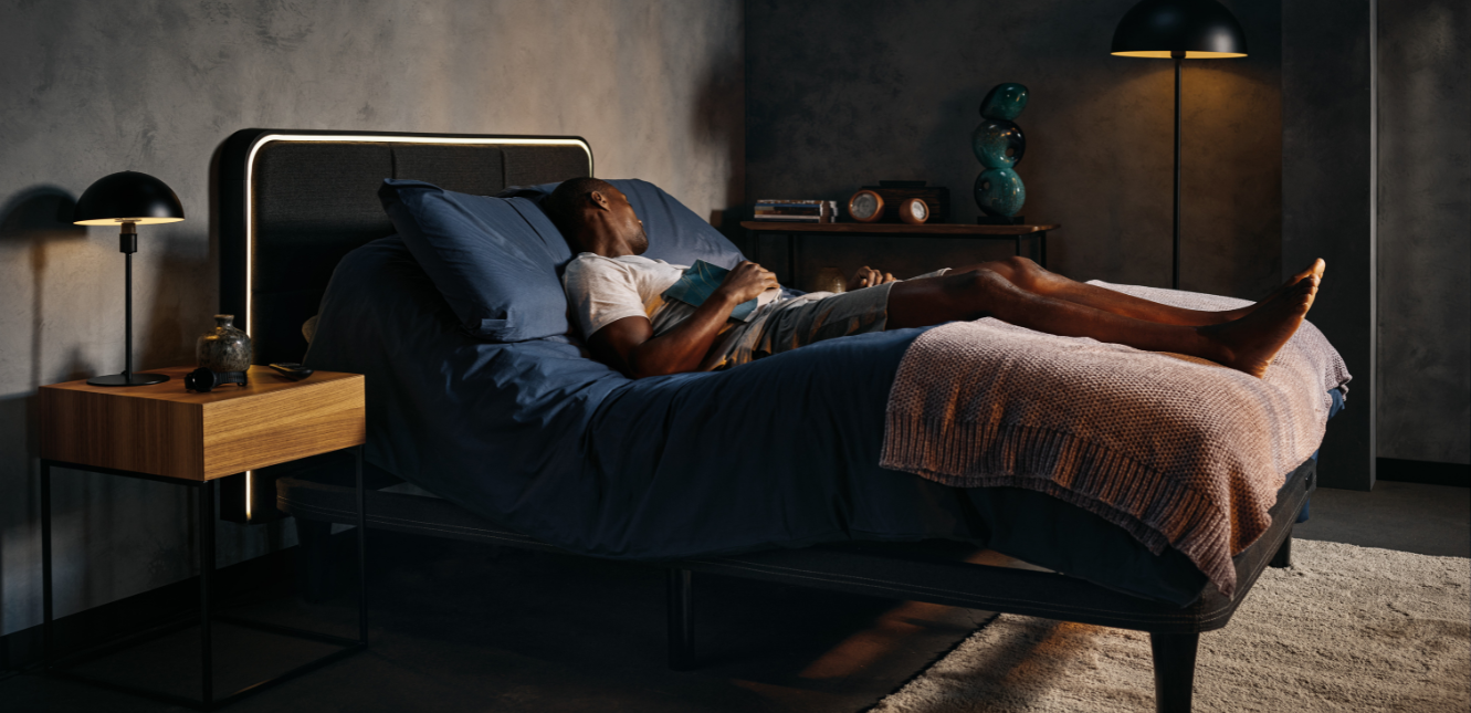Man sleeping in an ErgoSportive adjustable bed
