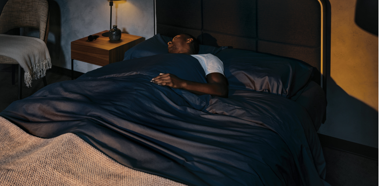 Swimmer resting on an adjustable bed
