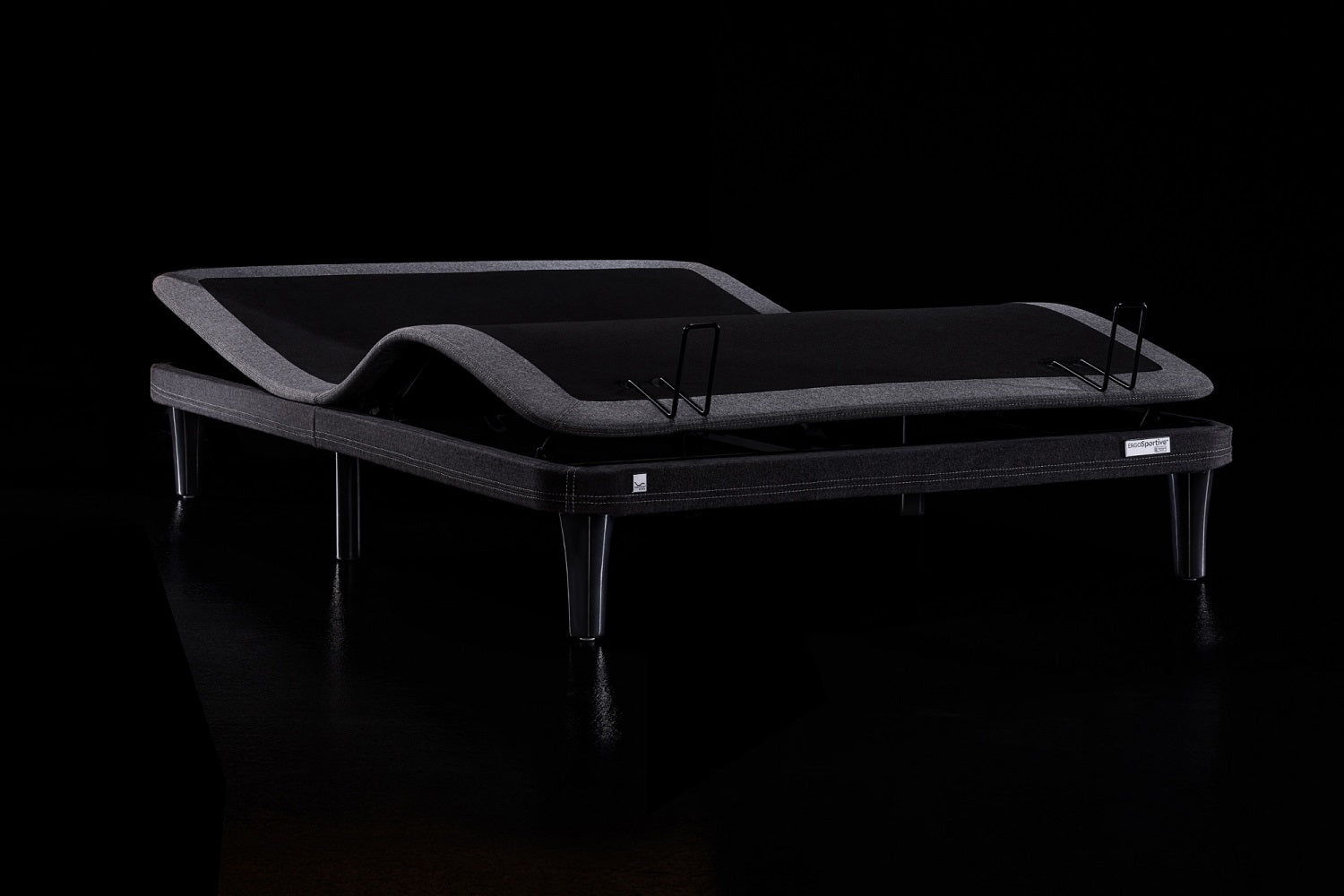 Repeated image of the adjustable bed frame without a mattress, showing its sleek black design.
